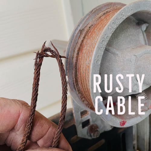 Rusty garage door cables for repair